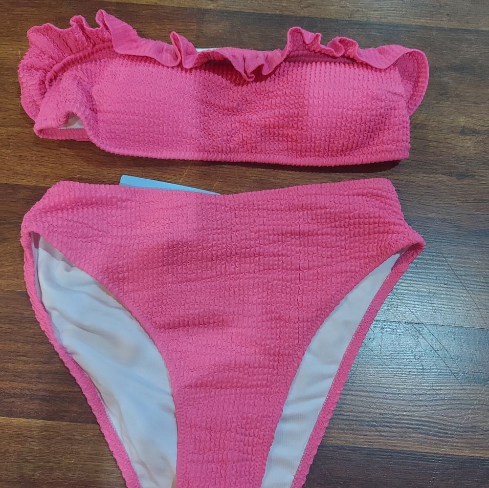 Pink ruffle bathing suit. Brand new